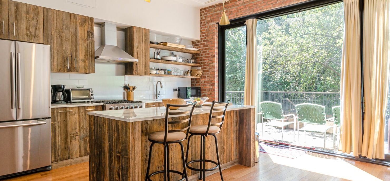 rustic kitchen with flat panel kitchen cabinet doors