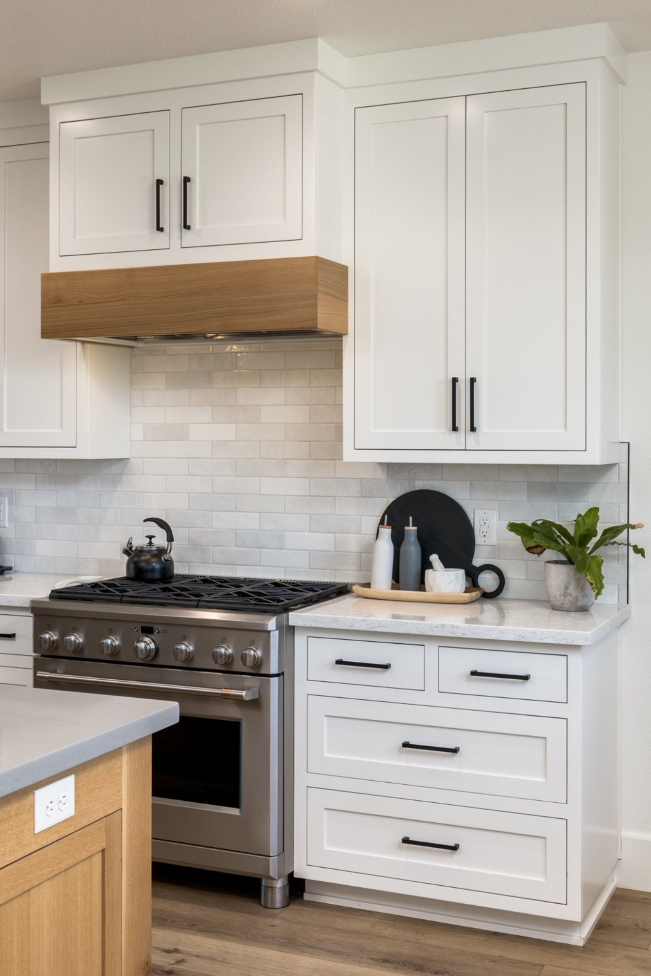 white shaker cabinets with crown molding on top