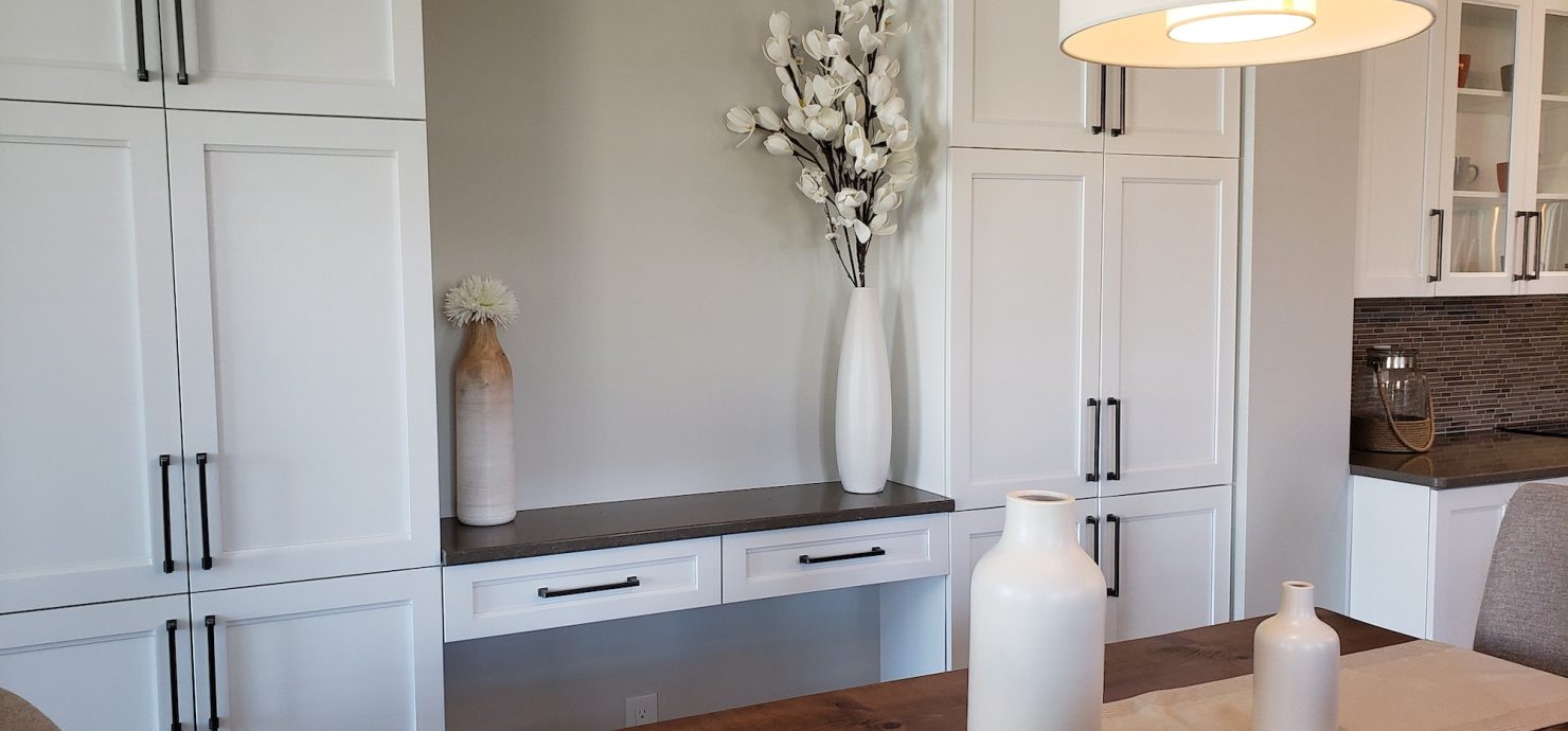 Modern kitchen interior design clean, minimal, in light and natural wood tones, built in cupboards