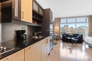 A kitchen that shows the results of painting laminate cabinets