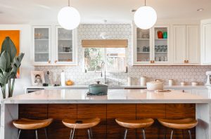 Painting oak cabinets white can make a kitchen look completely different.